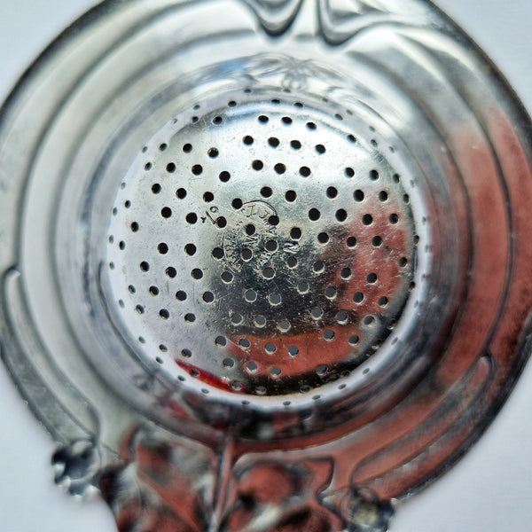 Antique Art Nouveau tea strainer