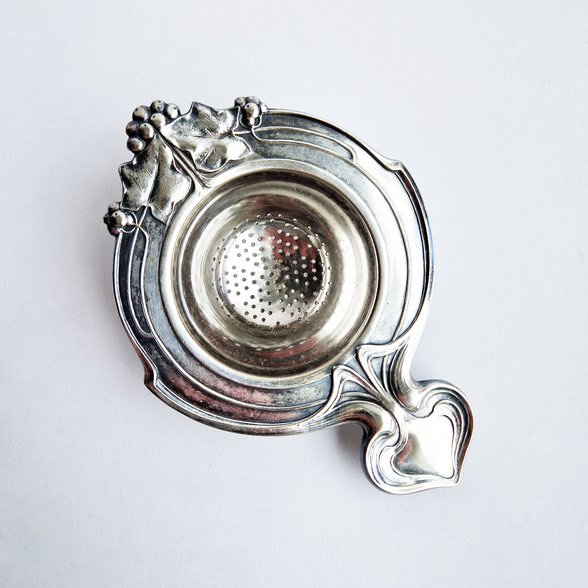 Antique Art Nouveau tea strainer