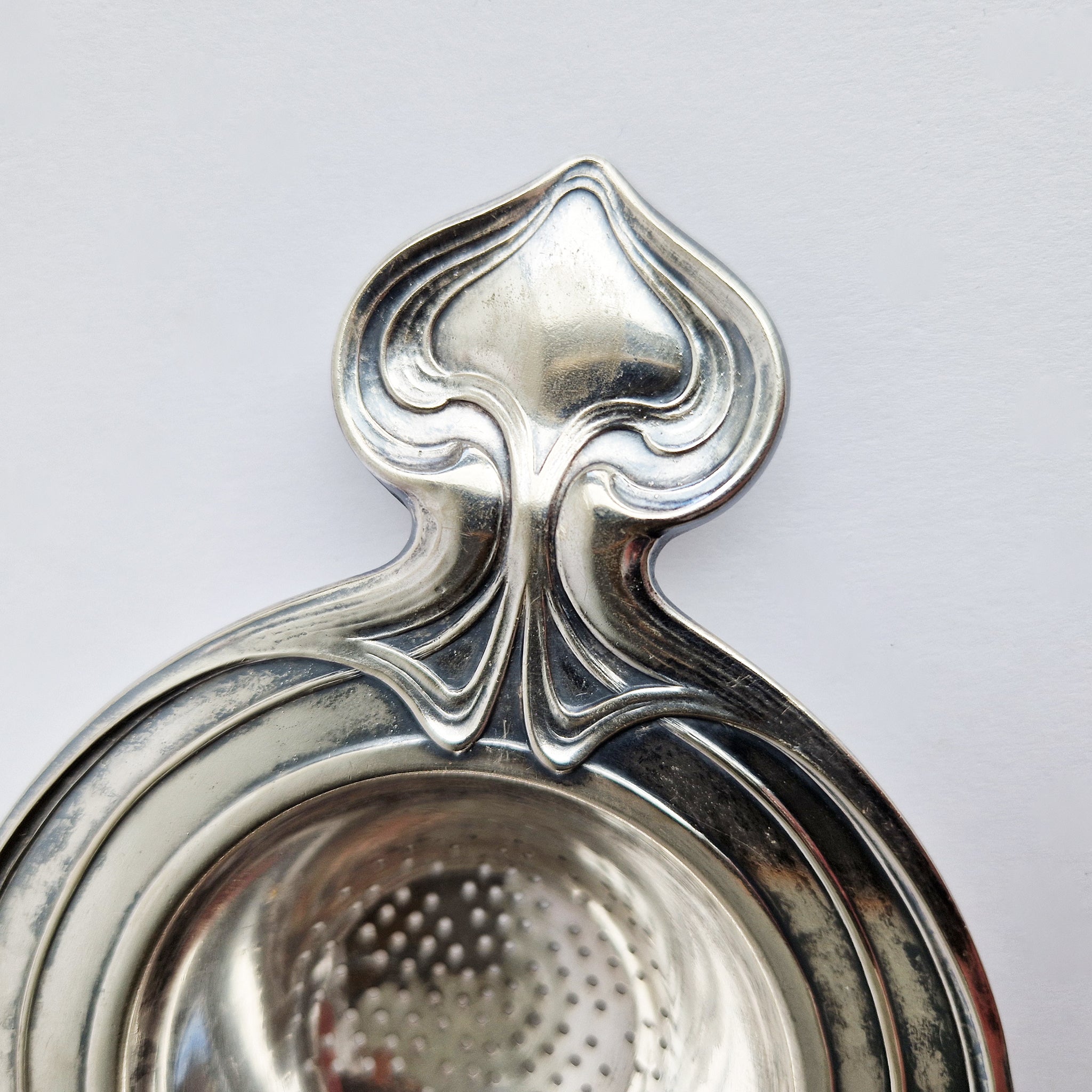 Antique Art Nouveau tea strainer