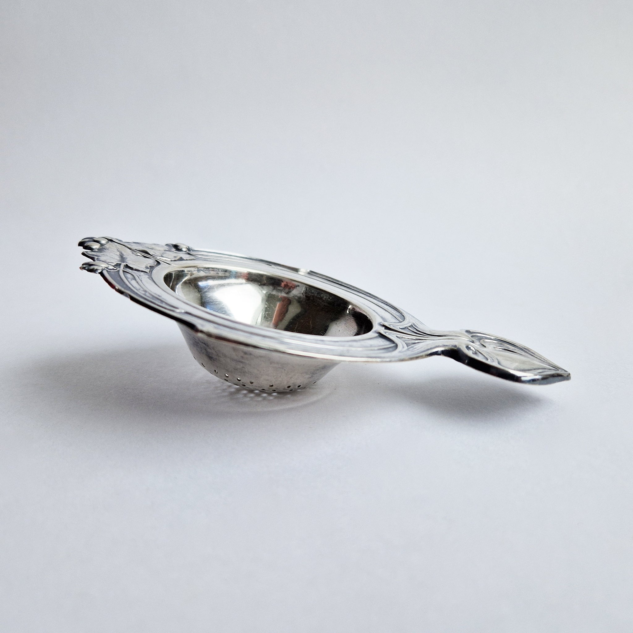 Antique Art Nouveau tea strainer