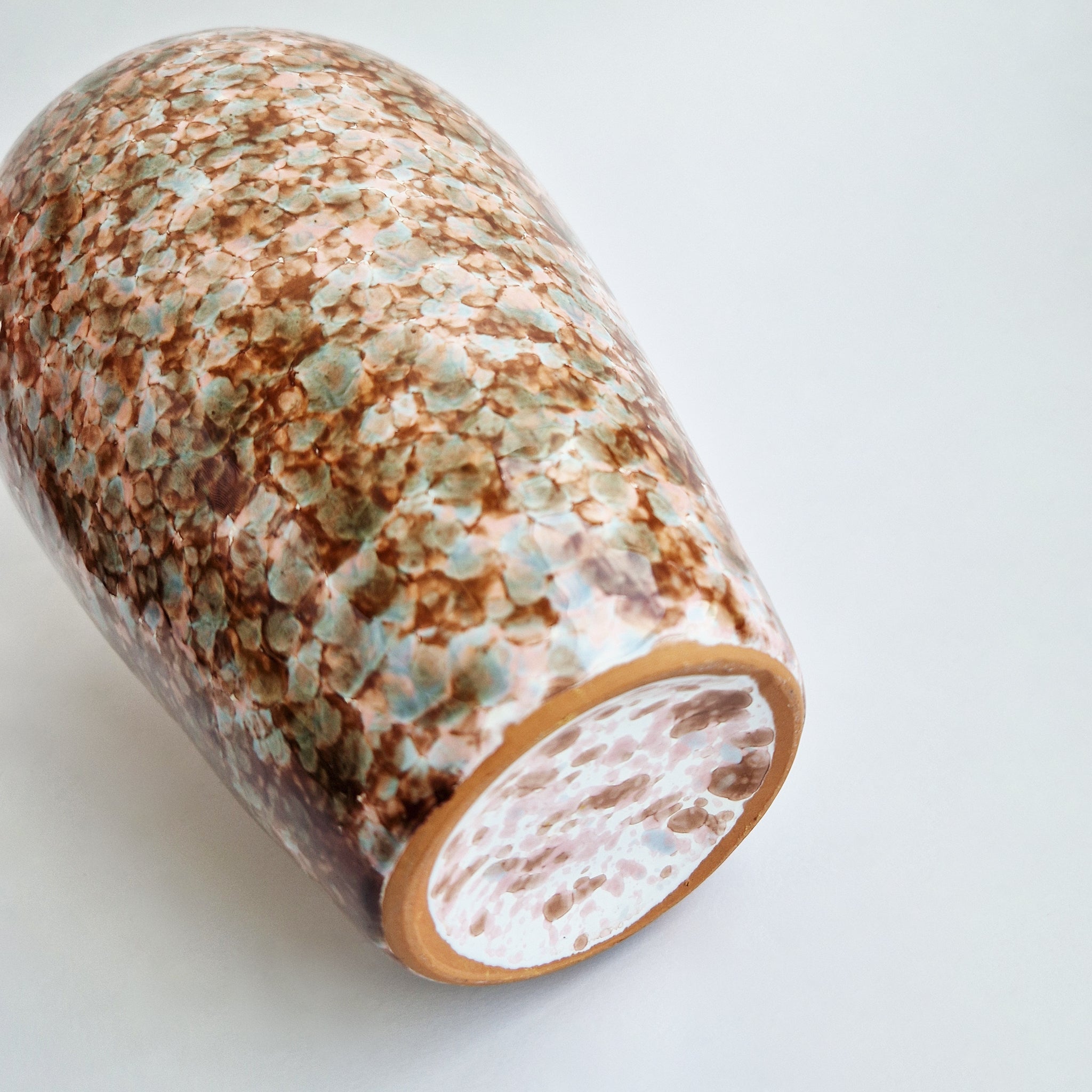 Pre-loved terracotta glazed vase