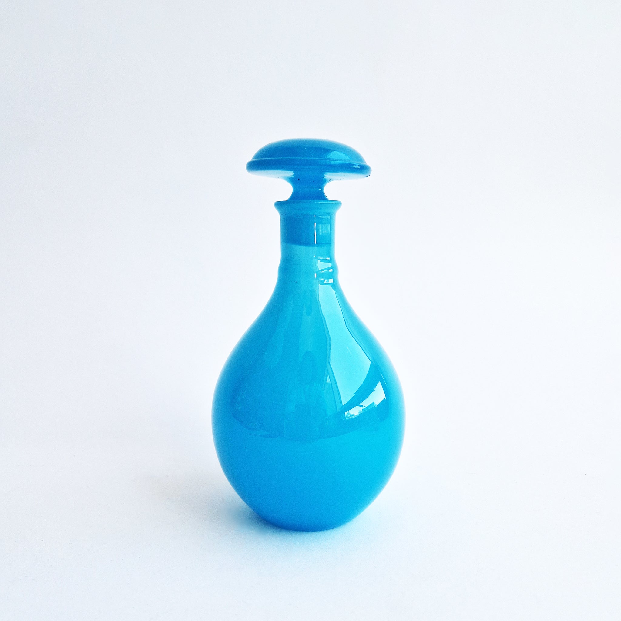 Vintage Italian opaline blue glass bottle