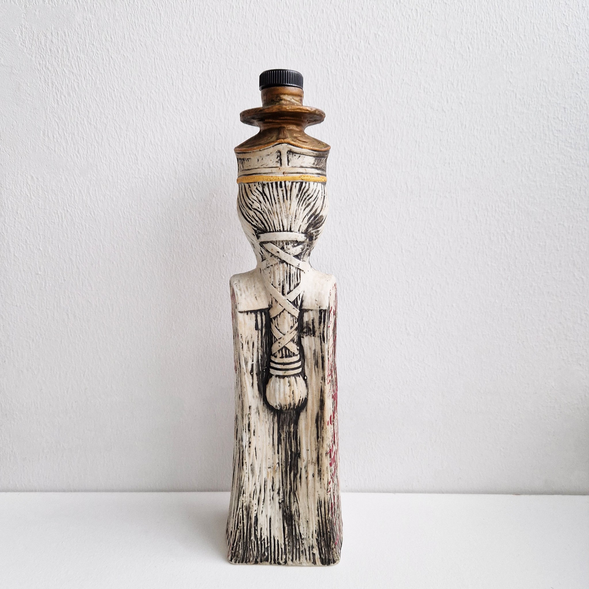 1960s ceramic liquor bottle in shape of a Queen