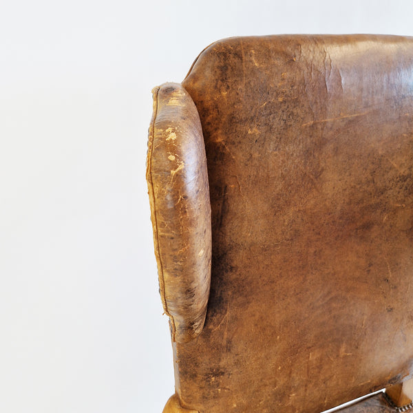 Mid-century Italian leather wingbacked armchair