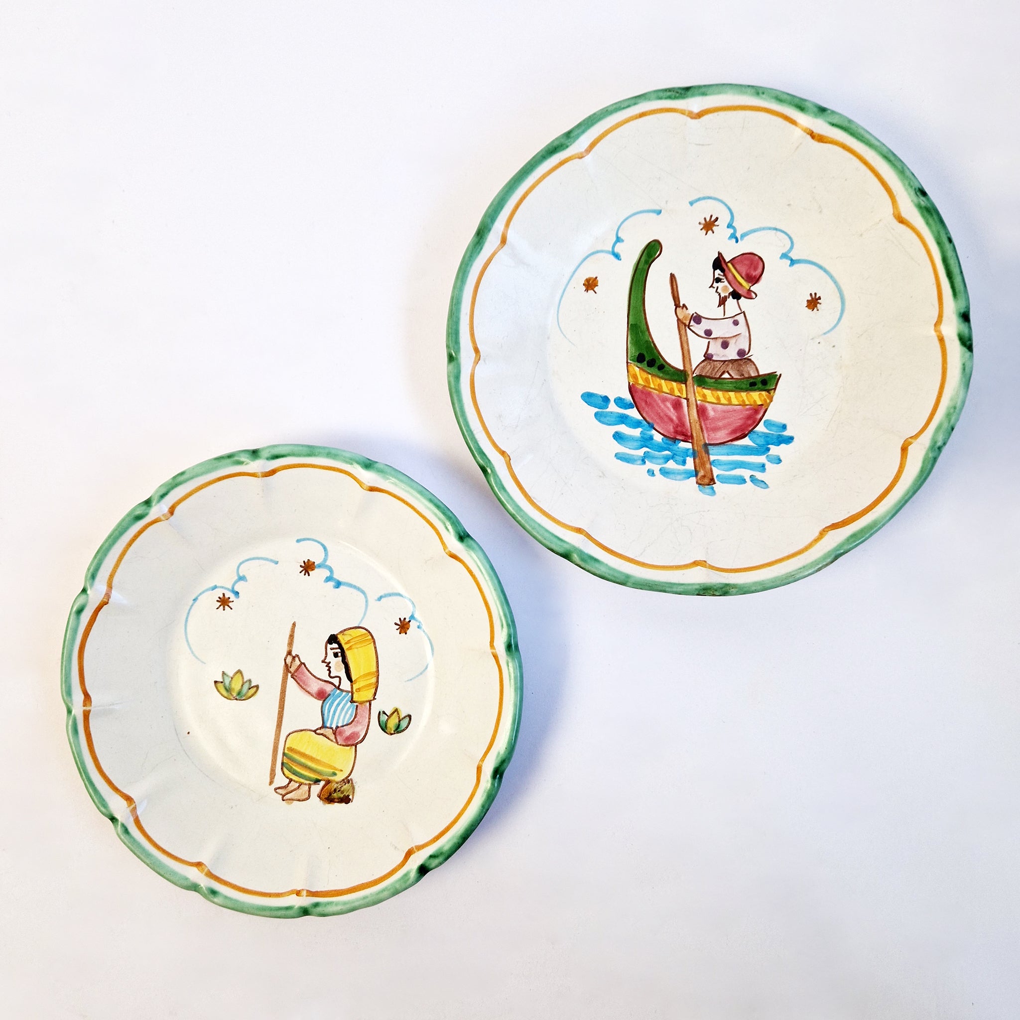 Mid-century hand-painted wall plate with fisherman