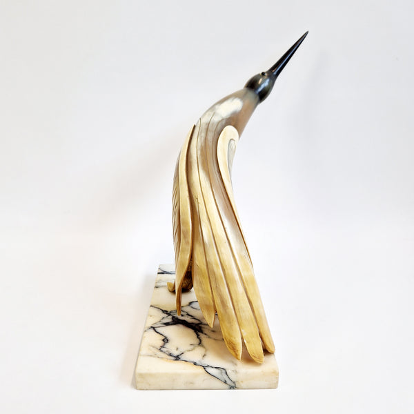 Mid-century horn bird statue on marble base