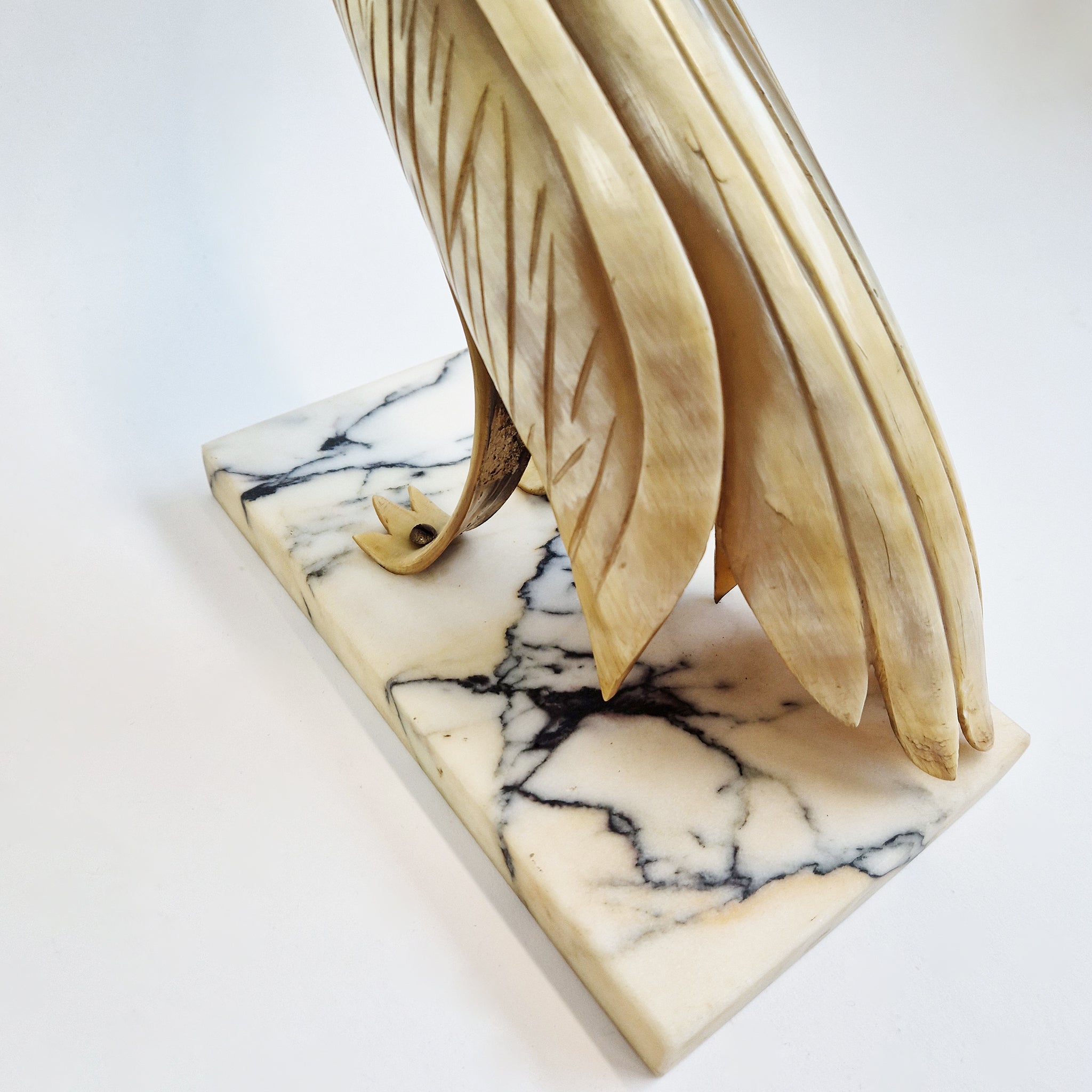 Mid-century horn bird statue on marble base