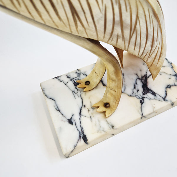 Mid-century horn bird statue on marble base