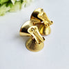 Pre-loved golden swirl clip-on earrings