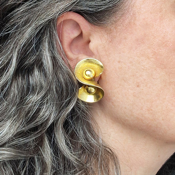 Pre-loved golden swirl clip-on earrings
