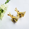 Pre-loved golden swirl clip-on earrings