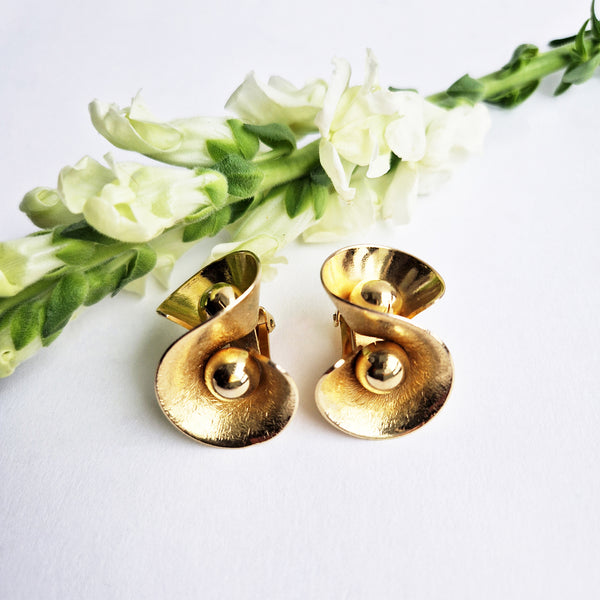 Pre-loved golden swirl clip-on earrings