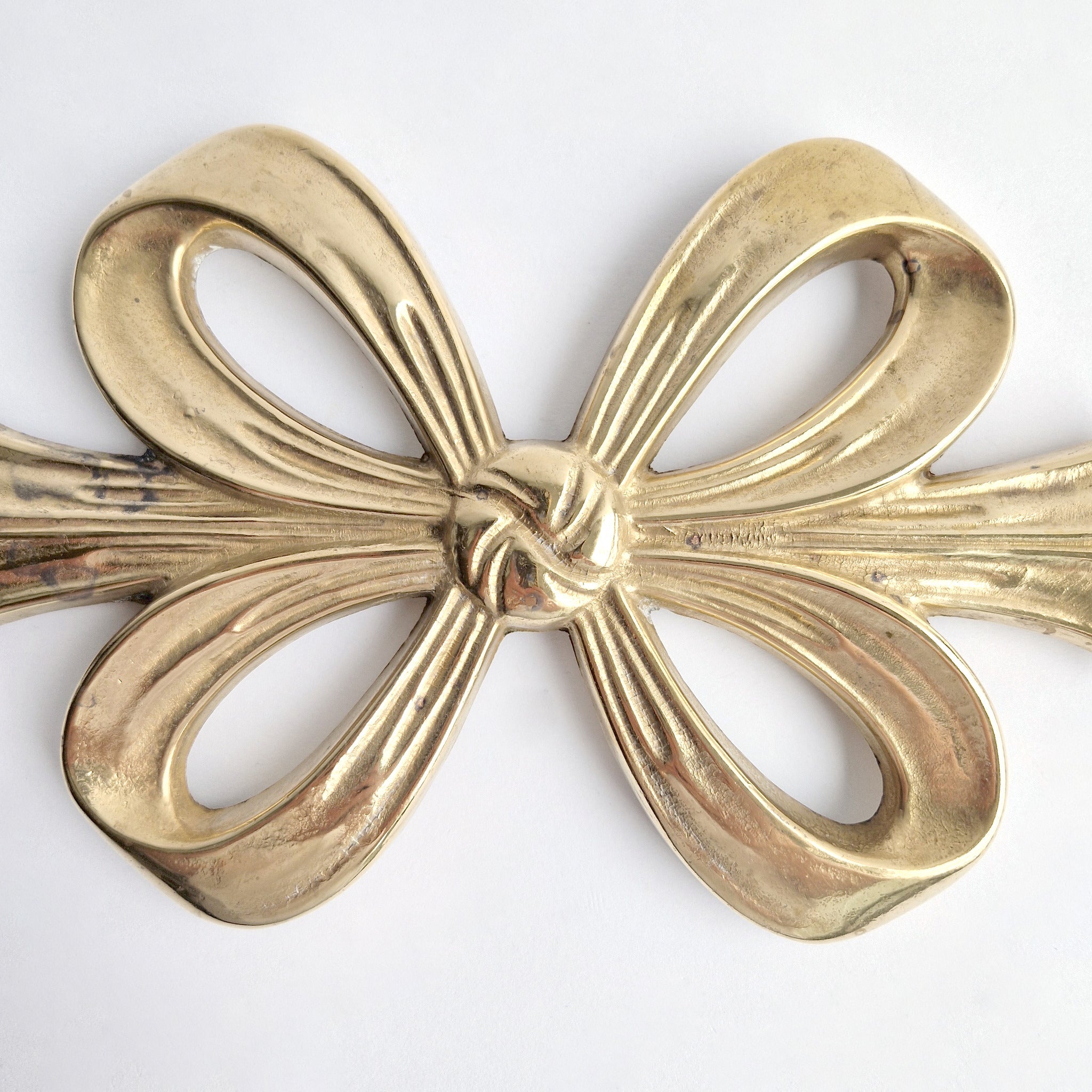 Vintage Italian brass bow trivet