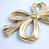 Vintage Italian brass bow trivet
