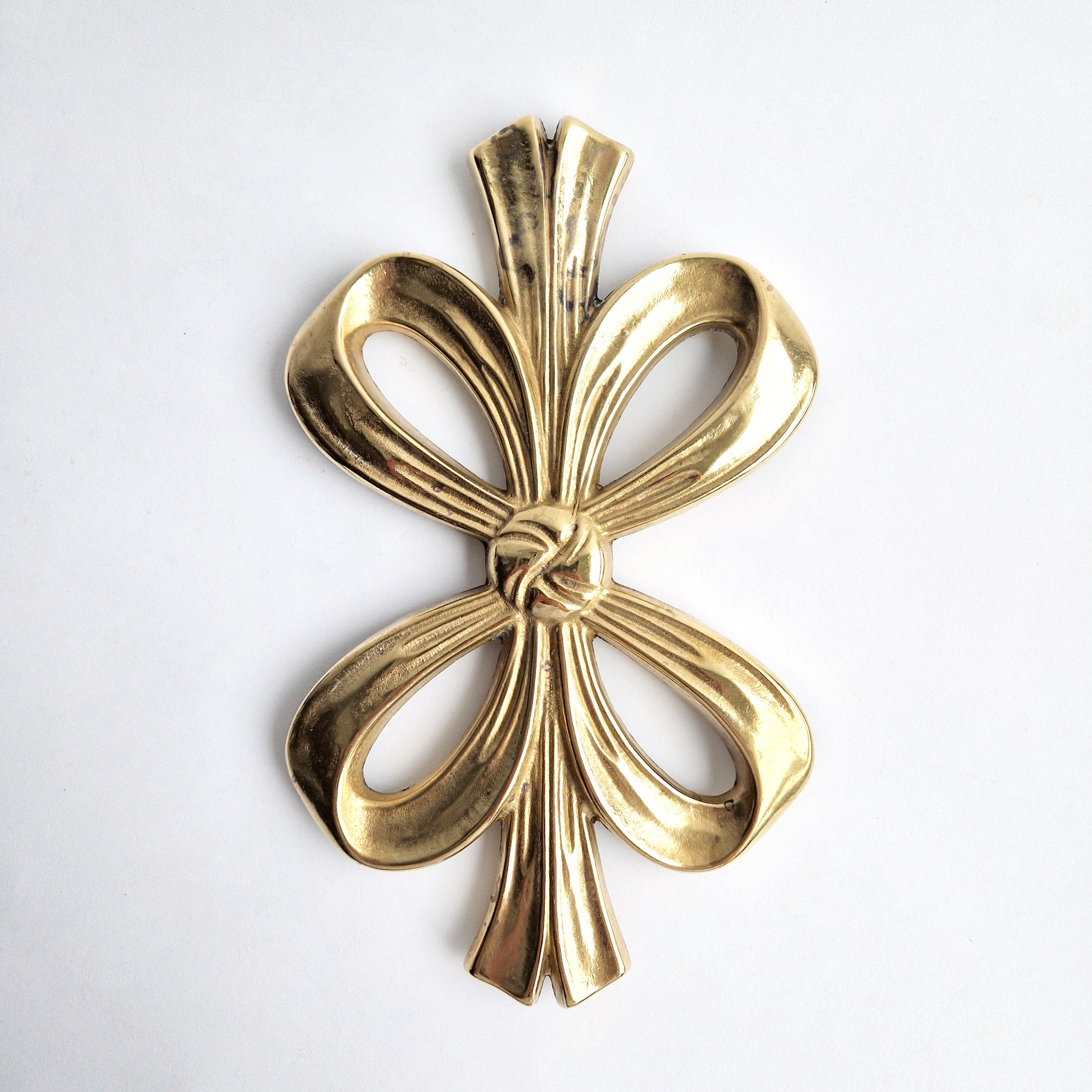 Vintage Italian brass bow trivet