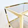 Vintage Italian brass side table on wheels