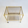 Vintage Italian brass side table on wheels