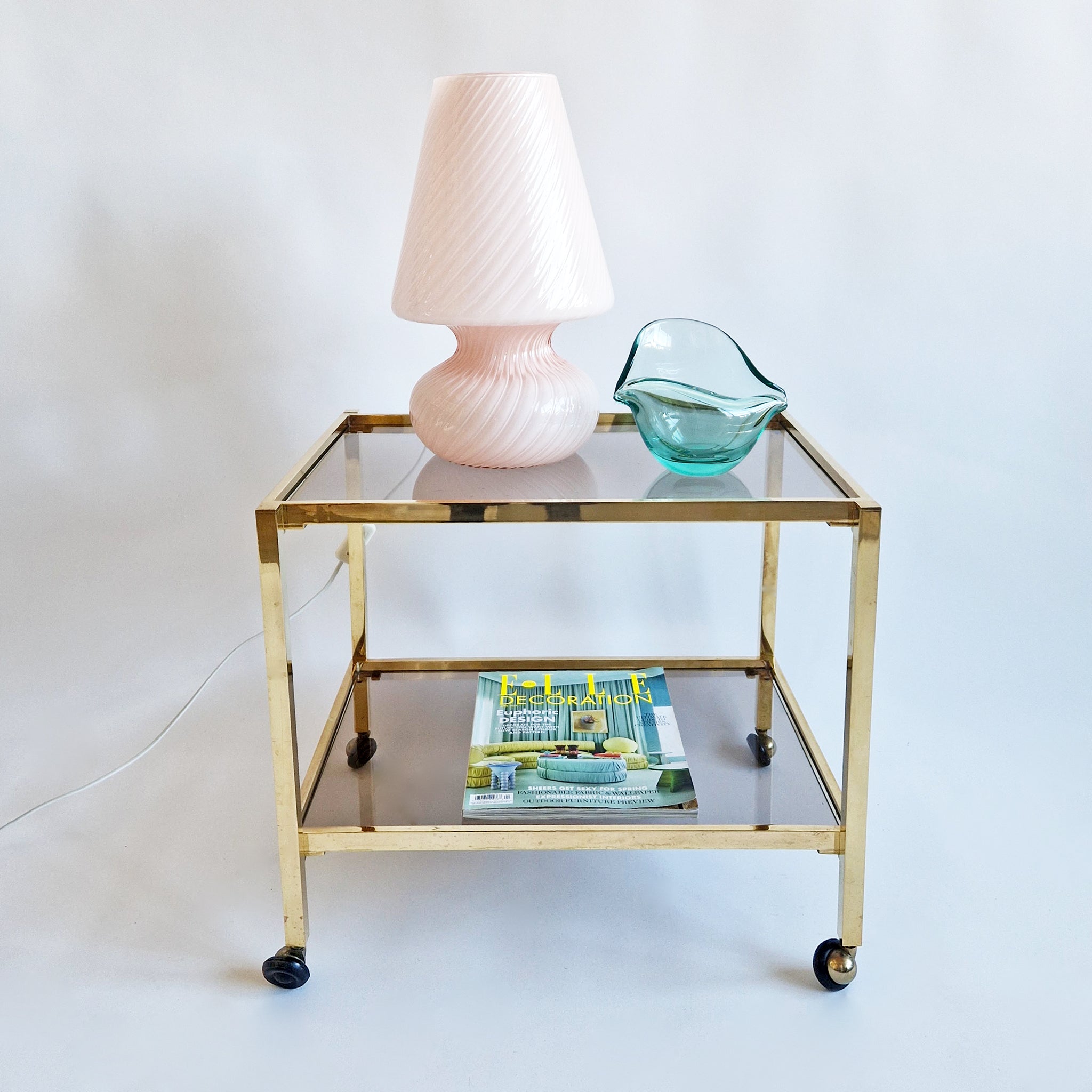 Vintage Italian brass side table on wheels