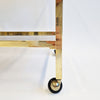 Vintage Italian brass side table on wheels