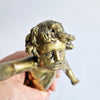 Vintage Italian bronze putto with apple
