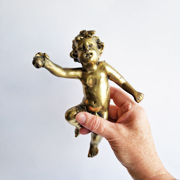 Vintage Italian bronze putto with apple