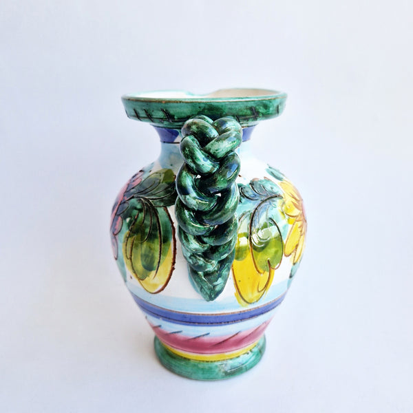 Vintage Italian maiolica jug with braided handle
