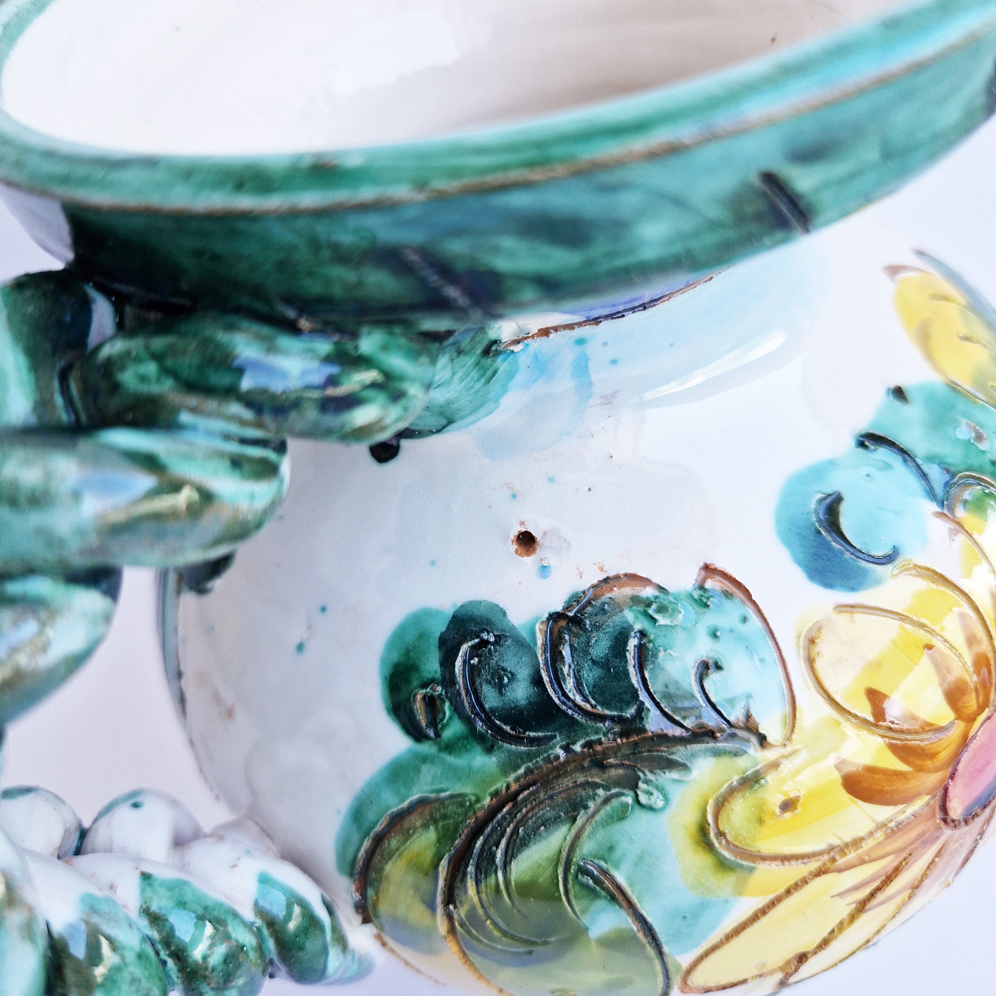 Vintage Italian maiolica jug with braided handle