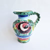 Vintage Italian maiolica jug with braided handle