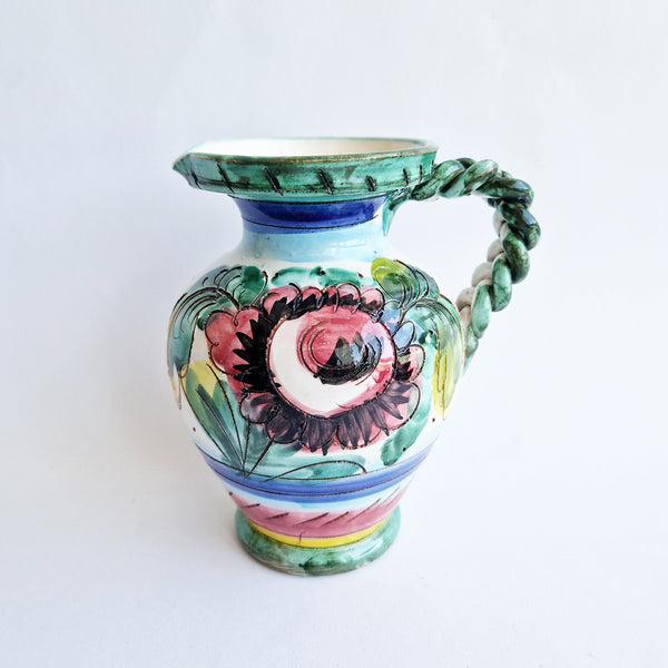 Vintage Italian maiolica jug with braided handle