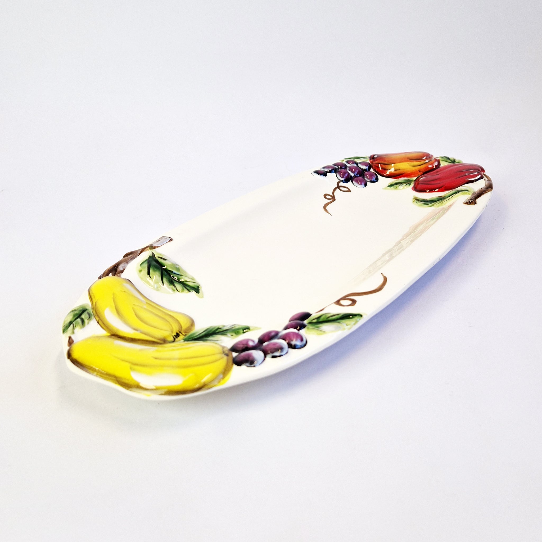 Vintage Italian ceramic dish with fruit