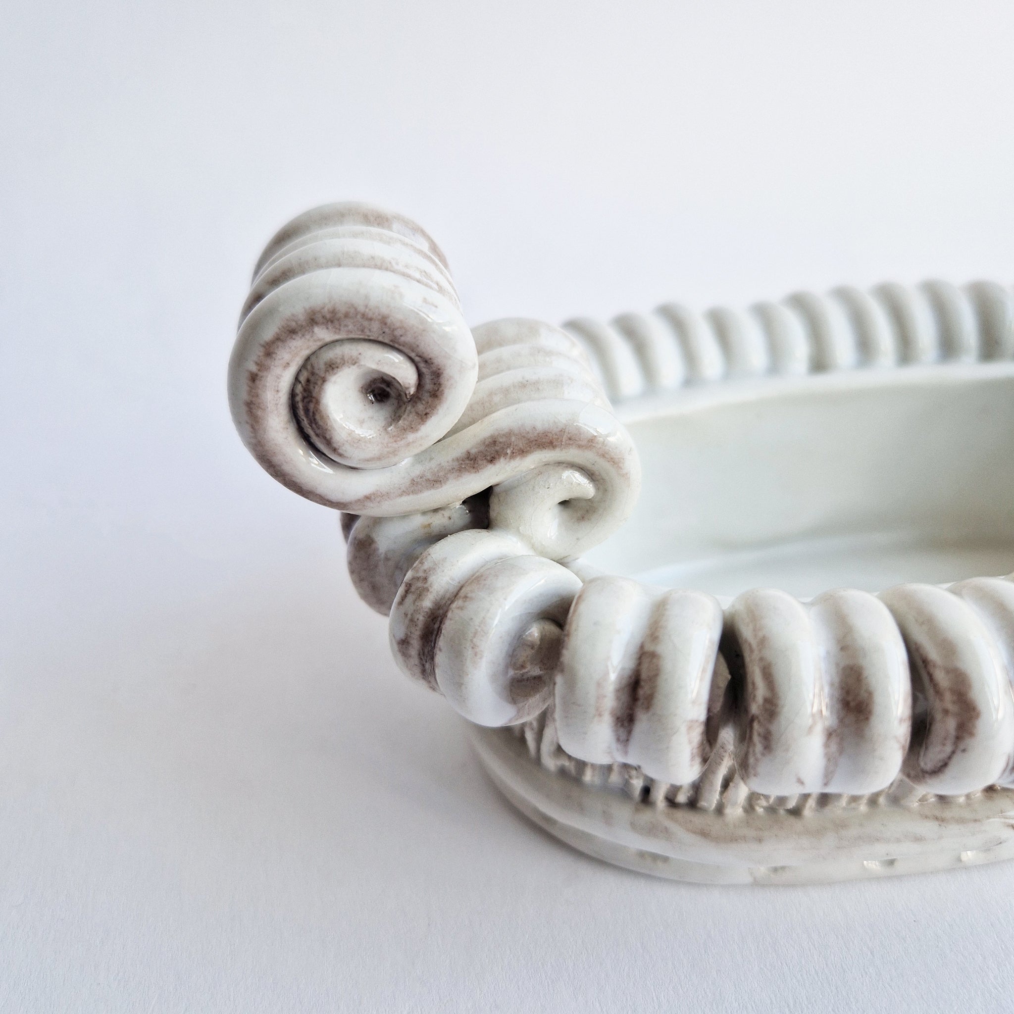 Vintage Italian trinket dish with scrolls