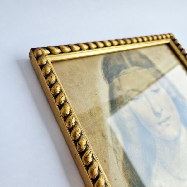 Vintage print of lady with gilded frame