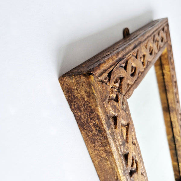 Vintage gilded wooden-framed mirror