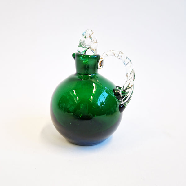 Hand-blown vintage green glass cruet bottle