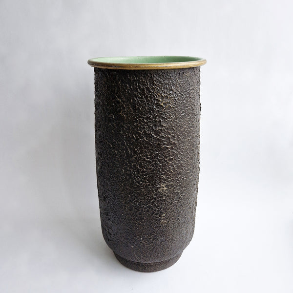 Vintage umbrella stand with flowers