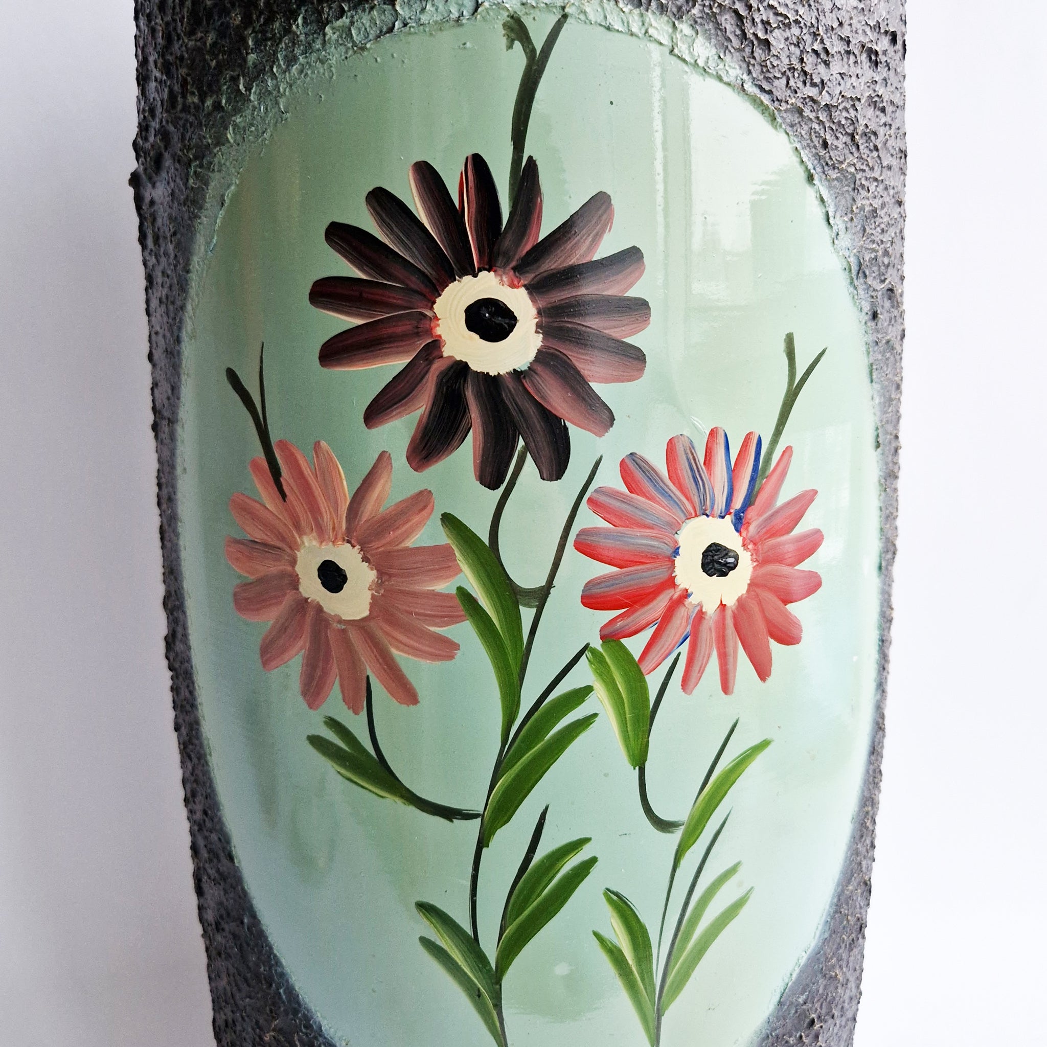 Vintage umbrella stand with flowers