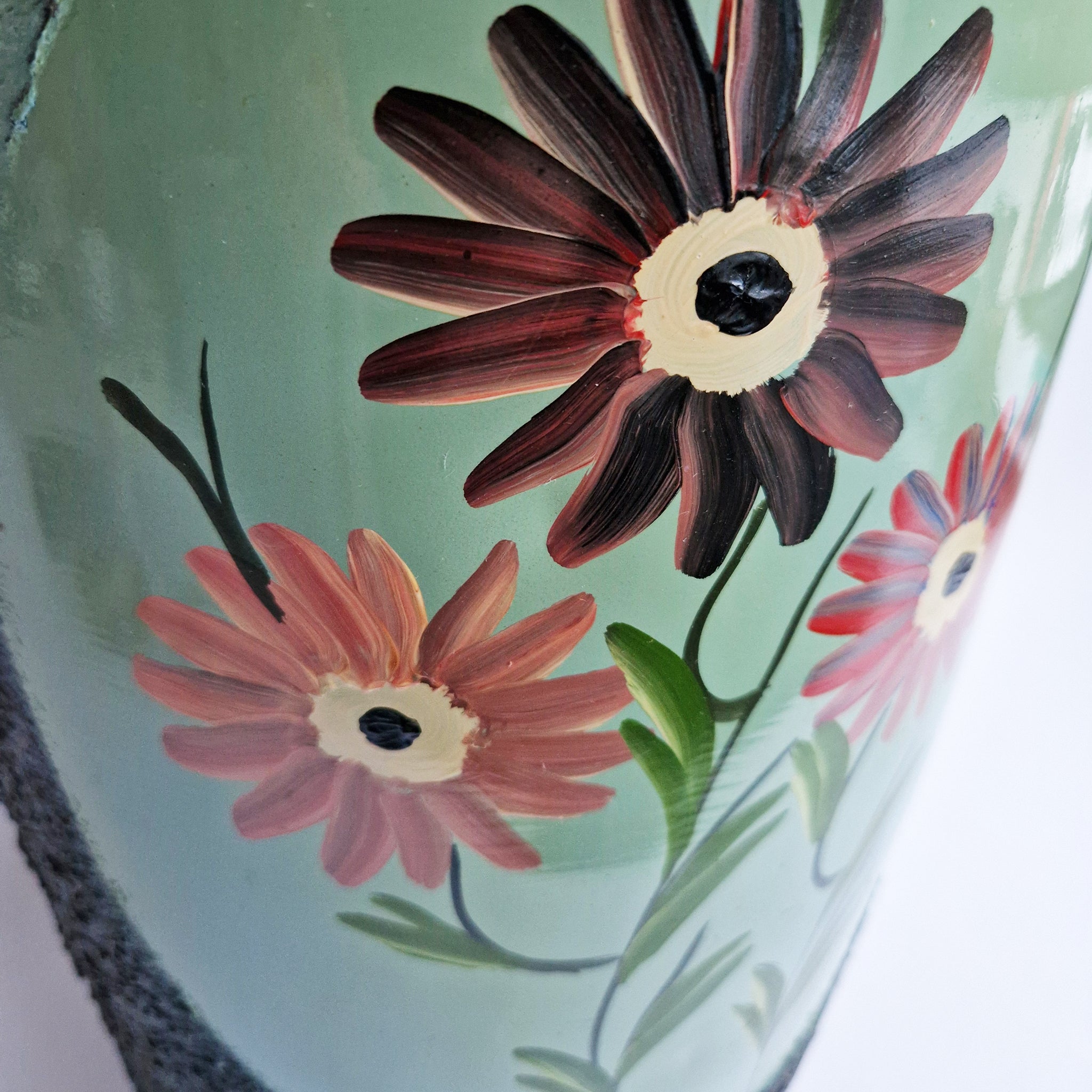 Vintage umbrella stand with flowers