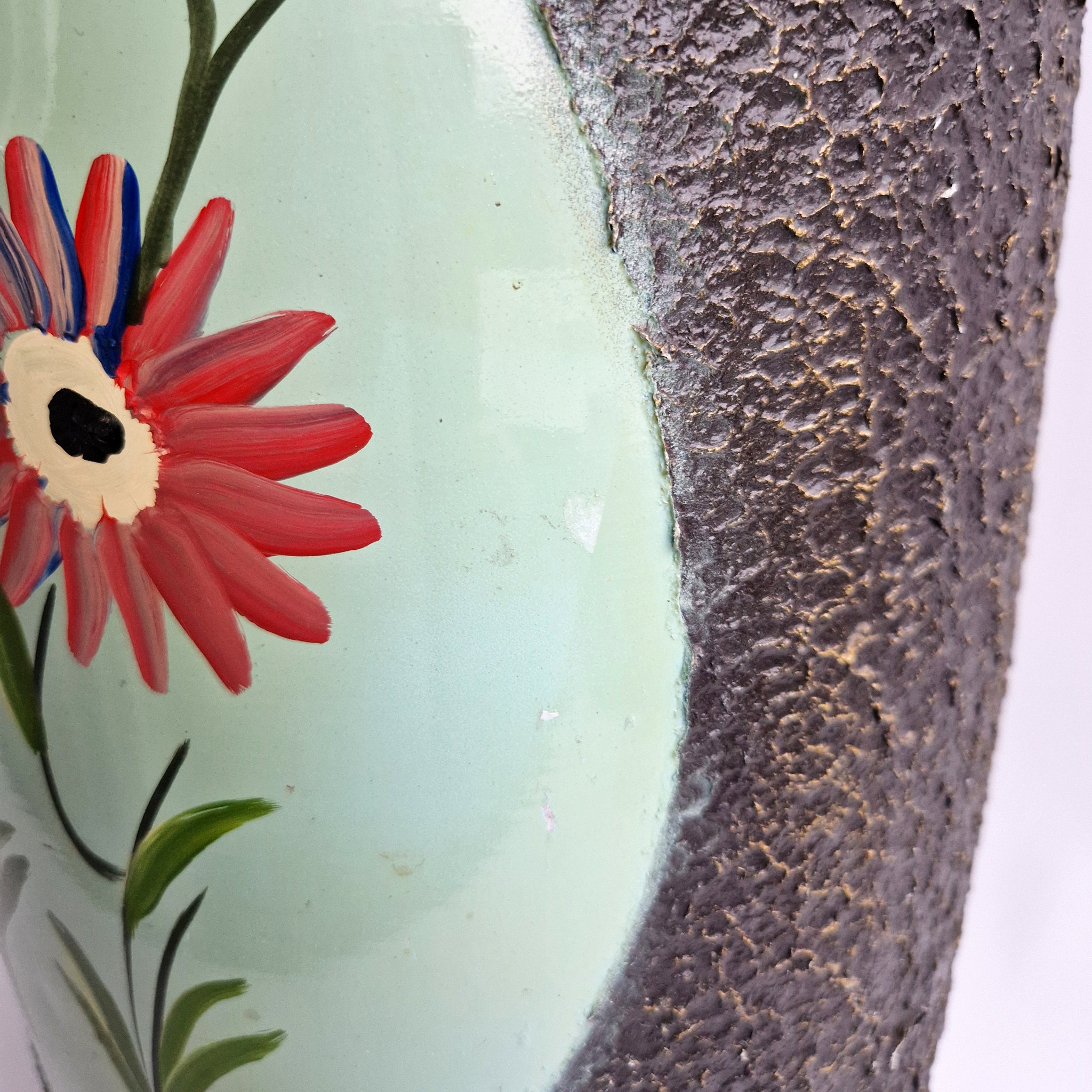 Vintage umbrella stand with flowers