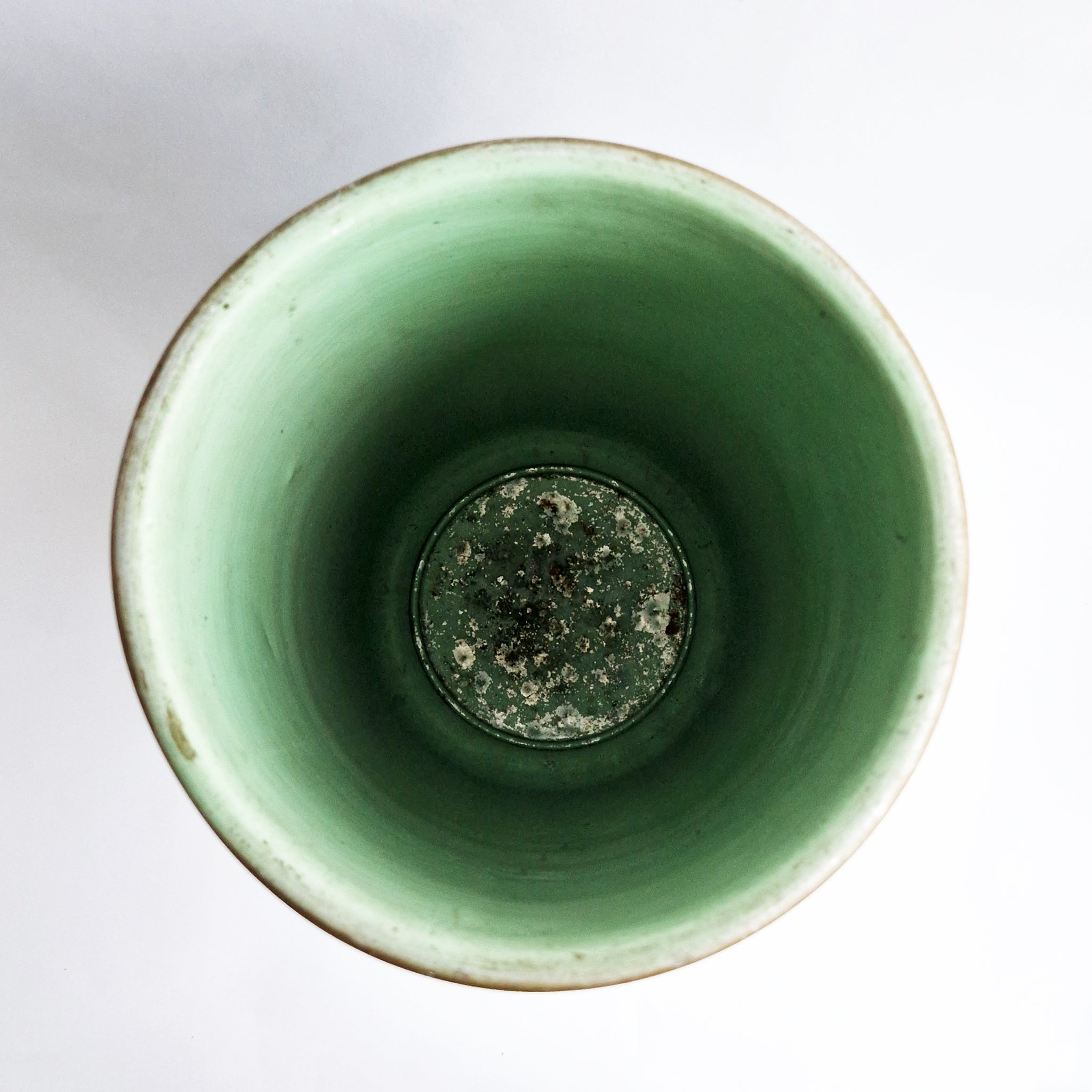 Vintage umbrella stand with flowers