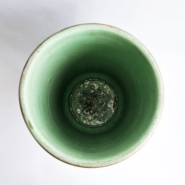 Vintage umbrella stand with flowers