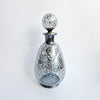 Vintage Venetian bottle with silver overlay
