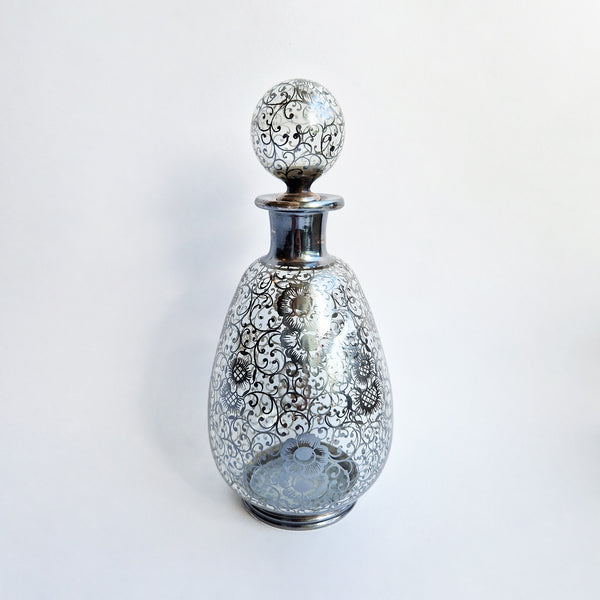 Vintage Venetian bottle with silver overlay