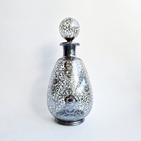 Vintage Venetian bottle with silver overlay