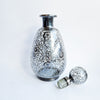 Vintage Venetian bottle with silver overlay