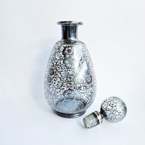 Vintage Venetian bottle with silver overlay