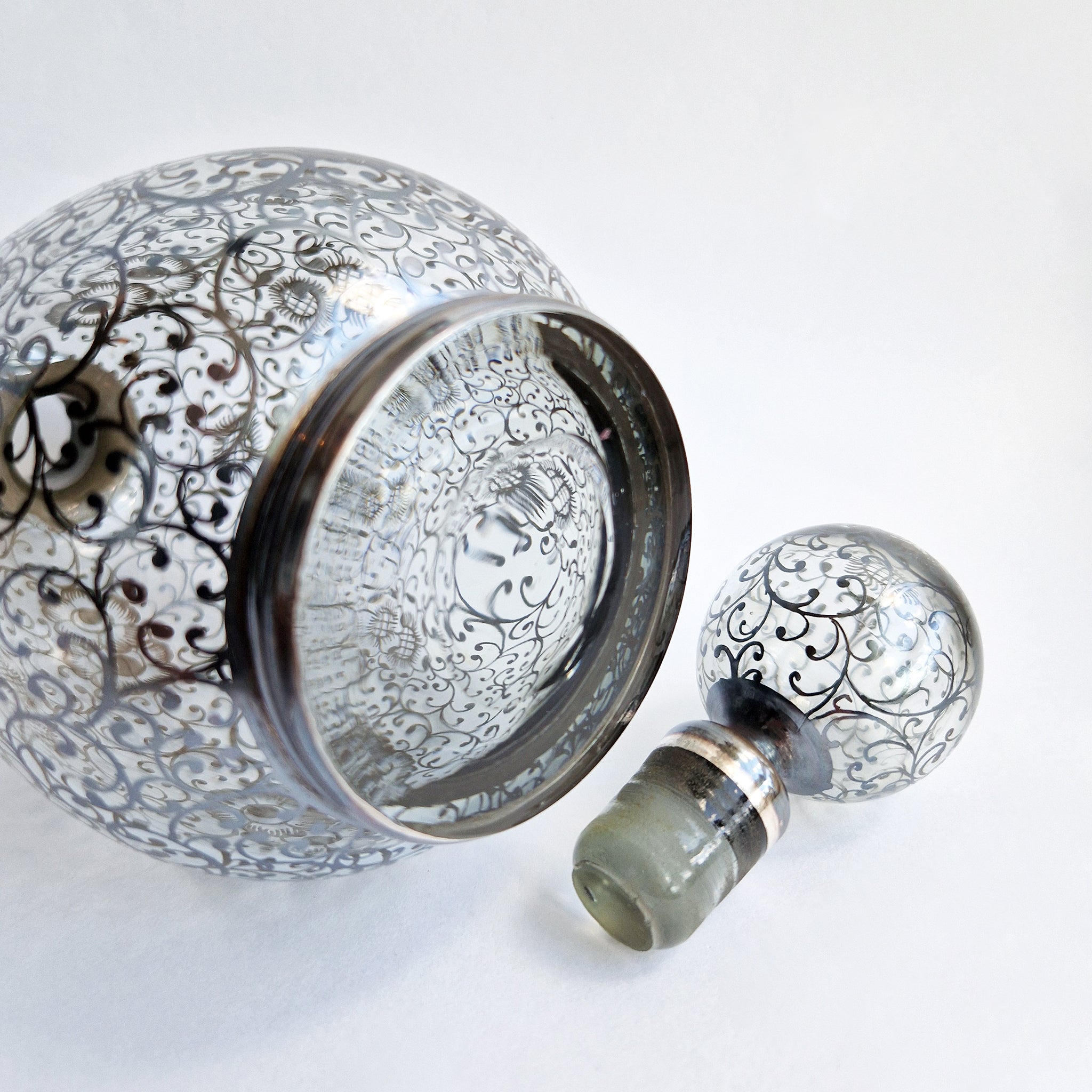 Vintage Venetian bottle with silver overlay