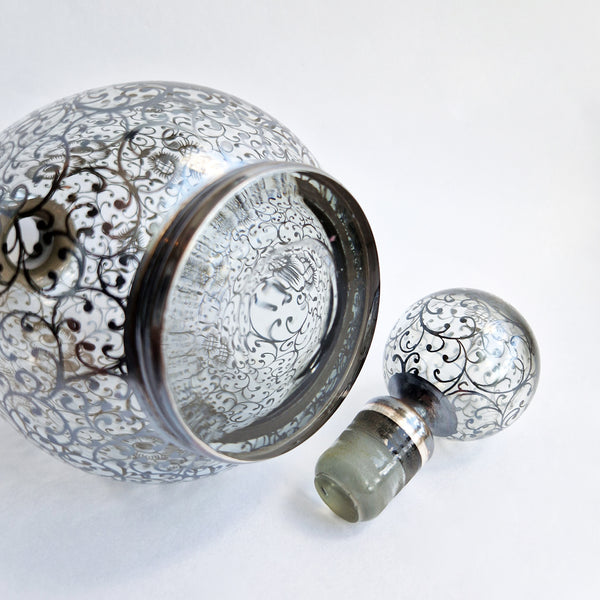 Vintage Venetian bottle with silver overlay