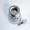 Vintage Venetian bottle with silver overlay
