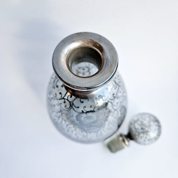 Vintage Venetian bottle with silver overlay