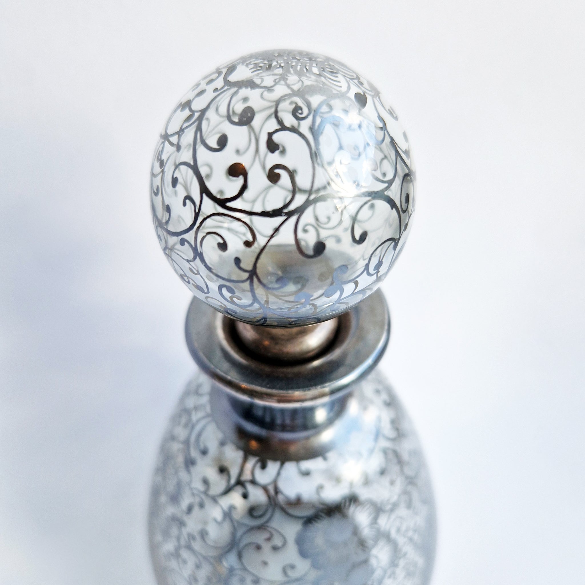 Vintage Venetian bottle with silver overlay